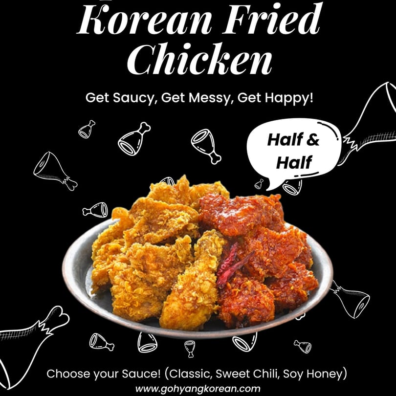 A plate of Gohyang Korean fried chicken, half classic crispy and half sweet chili sauced.