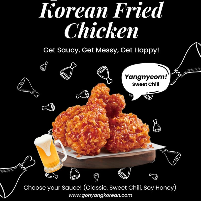 Gohyang Korean Restaurant's sweet chili fried chicken drumsticks with a mug of beer.